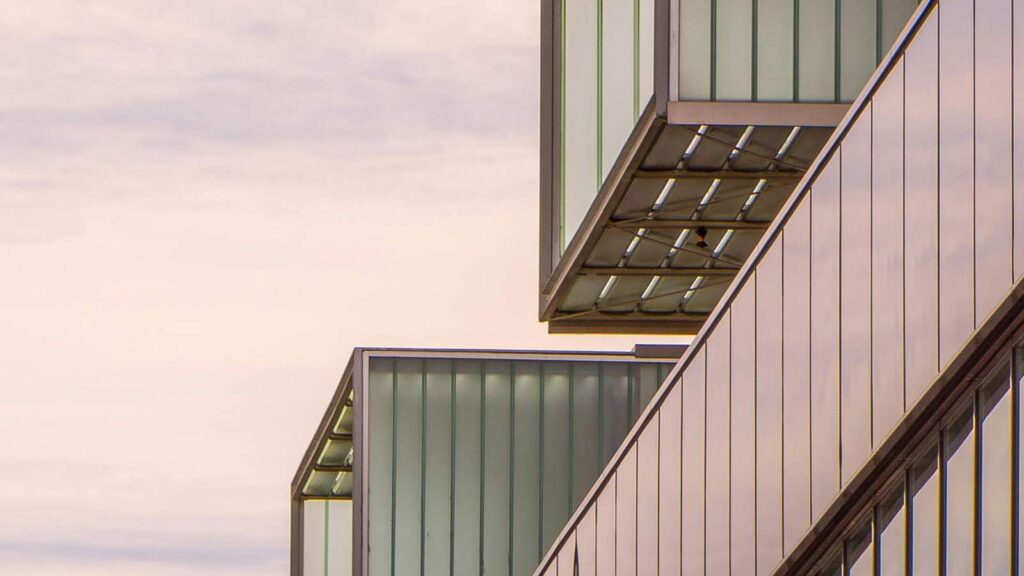 a building with glass walls Lending Industry mortgage ucc search artificial intelligence in real estate local title company title update