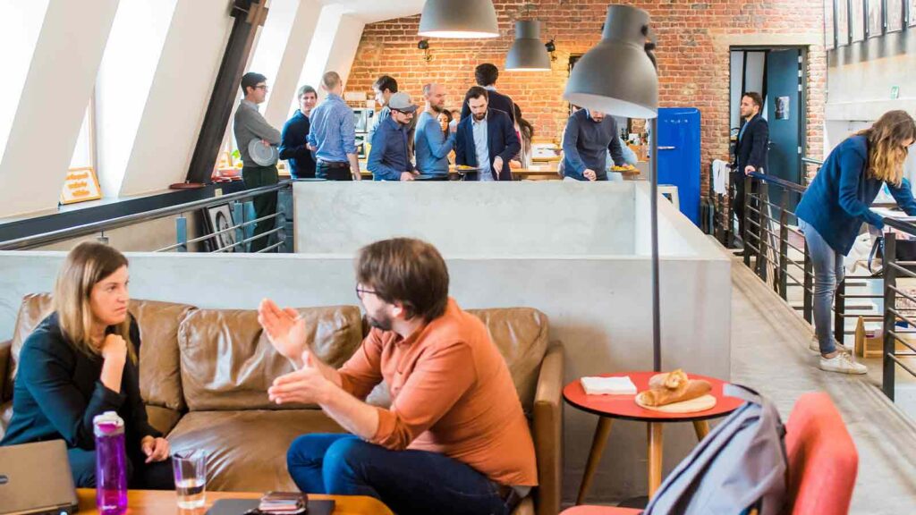 a group of people in a room title report