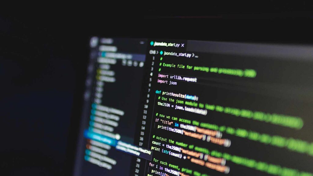 a computer screen with colorful code JSON