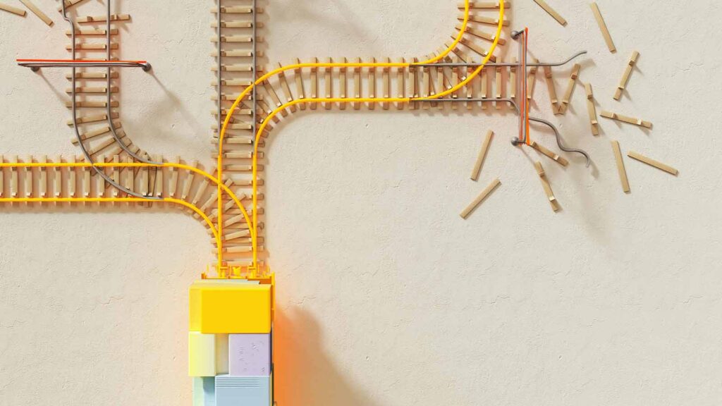 a toy train track with a yellow cable Title Search Updates