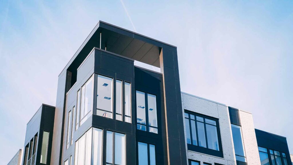 a building with many windows AI-Powered Title Searches