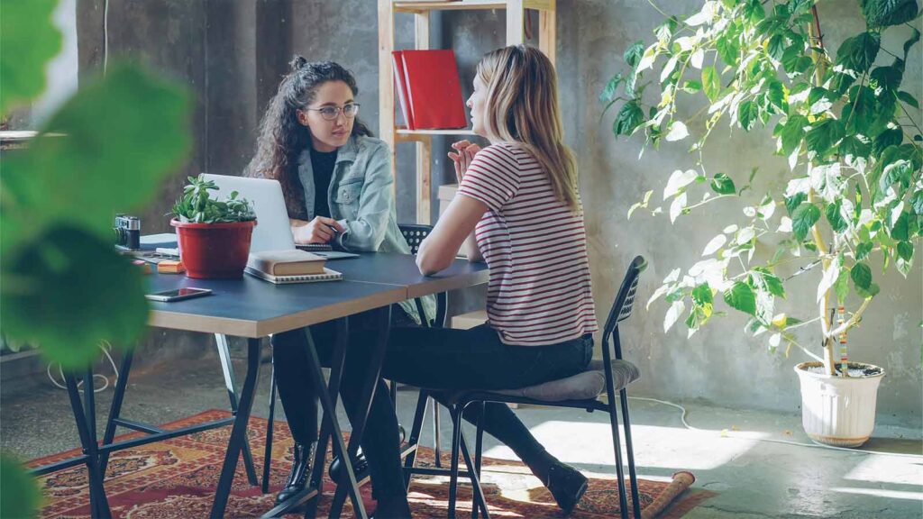 people talking at the table property intelligence
