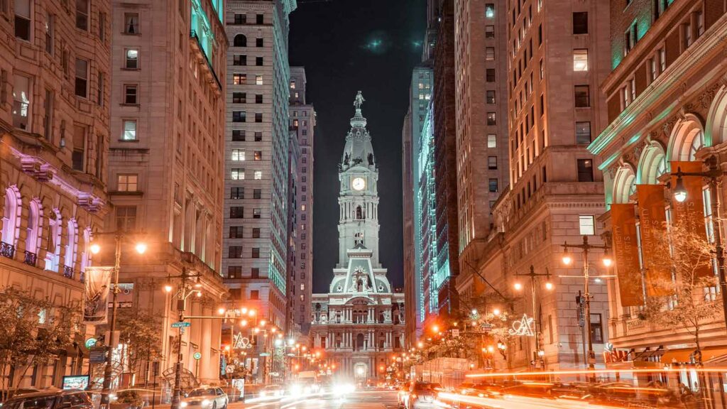 a city street with a clock tower philadelphia property search