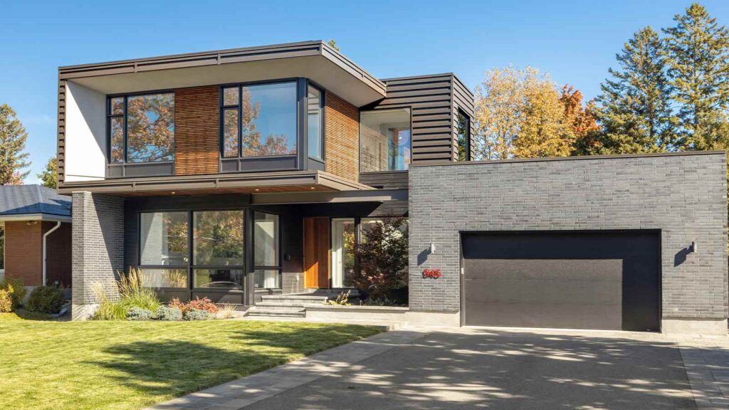 a house with a garage and a driveway webhook
