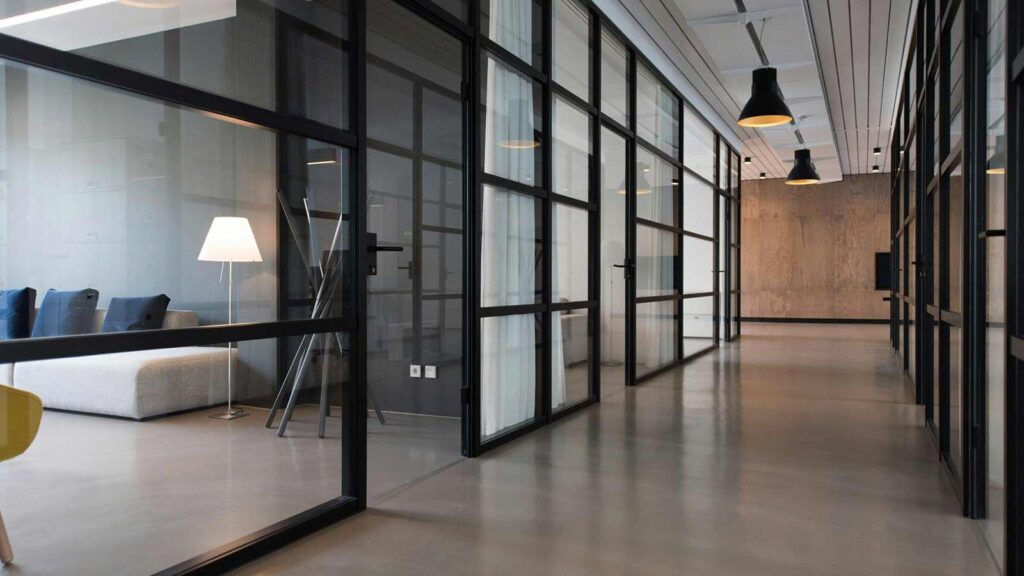 Modern office interior with glass walls Deed Ownership