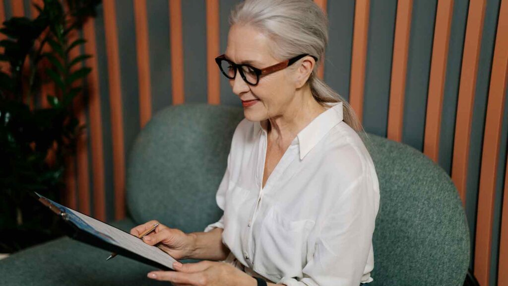 person looking over AI Title Research